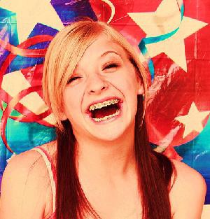 girl with braces laughing