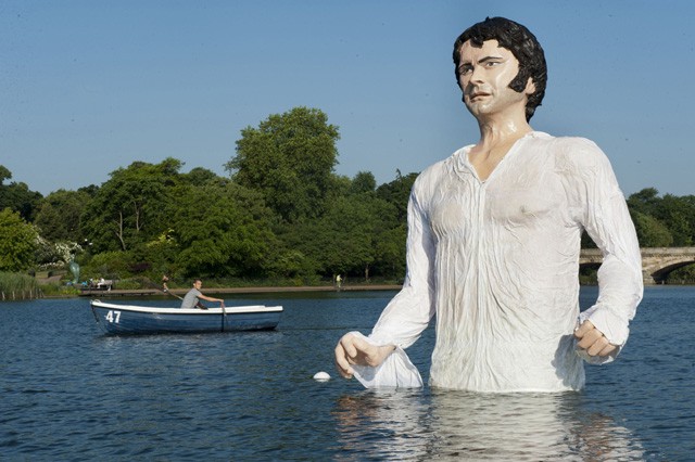 A giant statue of Mr. Darcy emerges from Serpentine Lake at Hyde Park in London